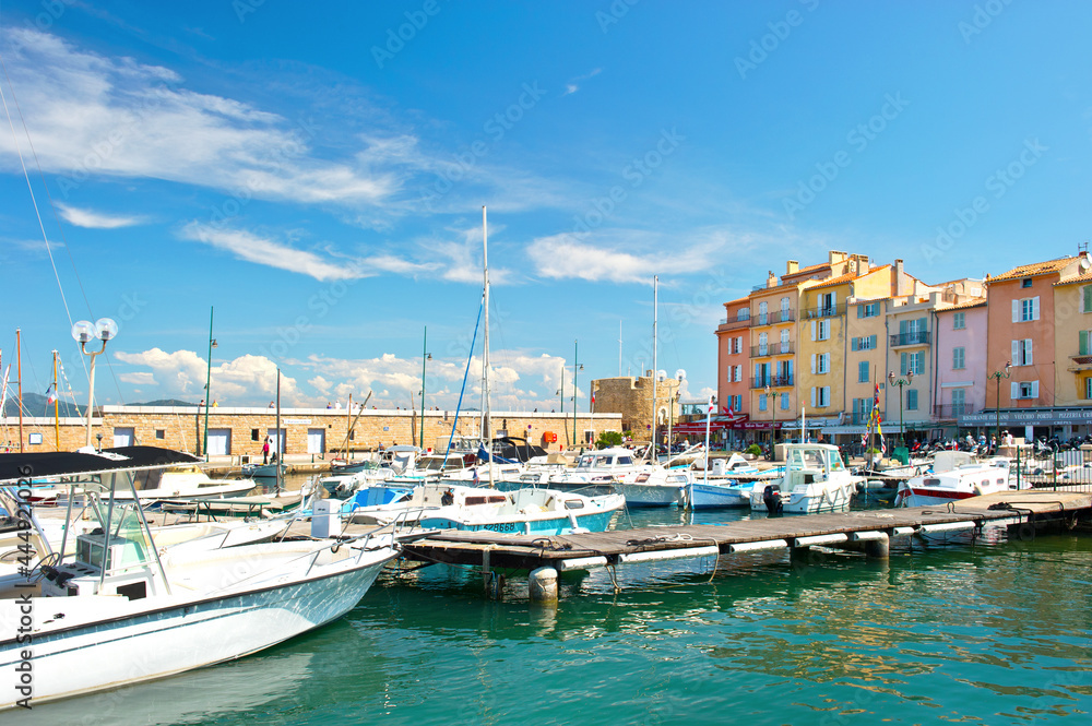 mediterranean landscape with boats and old buildings