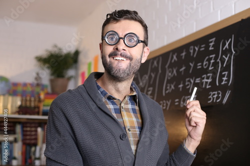 Math teacher with thick eyeglasses