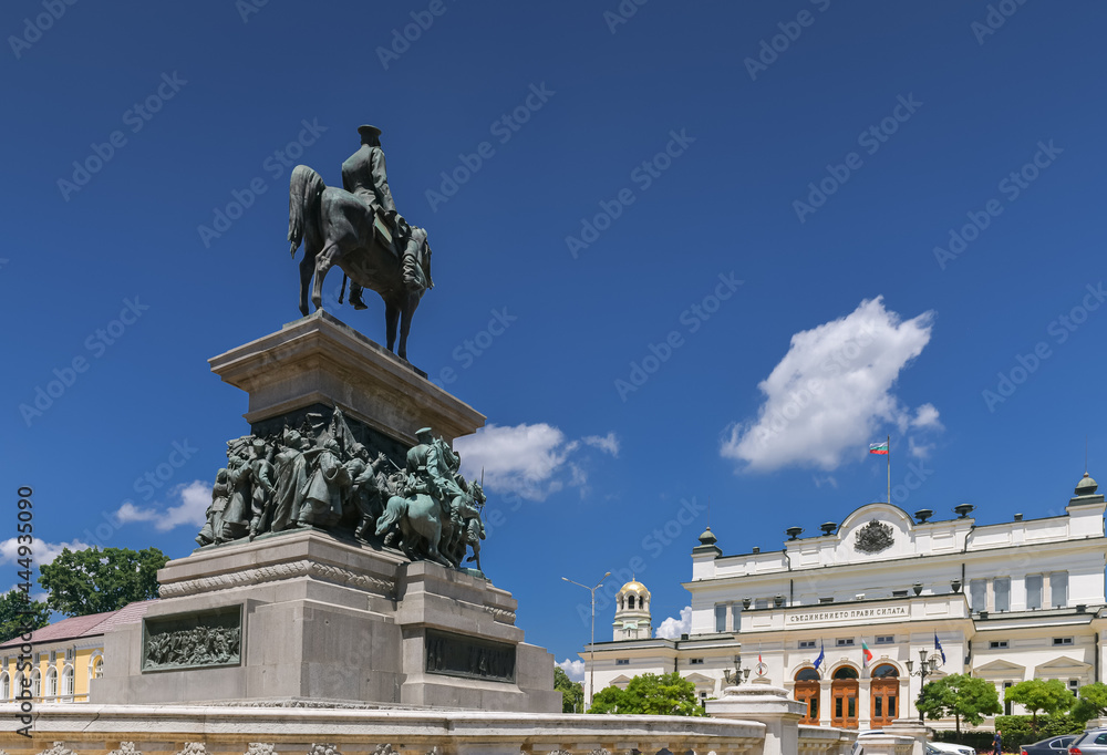 Fototapeta premium National Assembly of the Republic of Bulgaria building during a sunny summer day with blue sky and white clouds. Landmarks of Sofia.