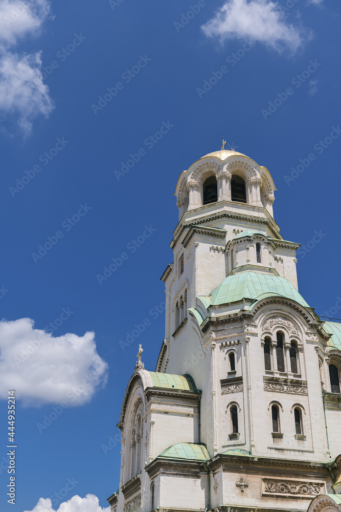 Landmarks of Bulgaria. Alexandr Nevski Cathedral in Sofia during a beautiful summer day with blue sky and white clouds. Touristic attraction.