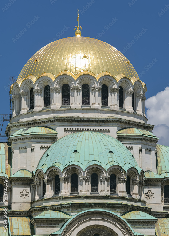 Landmarks of Bulgaria. Alexandr Nevski Cathedral in Sofia during a beautiful summer day with blue sky and white clouds. Touristic attraction.