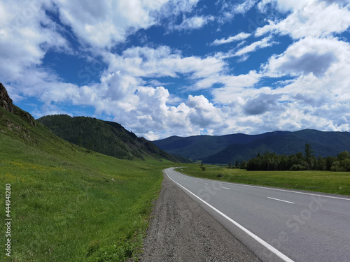 Vacation roadtrip landscape. Russian Altai mountains. Multa region. Holiday at home. Staycation concept. Long distanse road. Reduce carbon footprint. Sustainable lifestyle. Holiday trail. Local travel