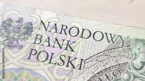 Macro PLN Polish 100 zloty banknotes background. One hundred zloty banknotes detail
