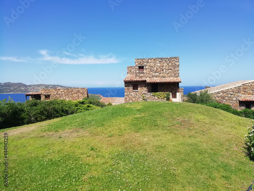 Foto Buildings of Capo Coda Cavallo village on the island of Sardinia in Italy