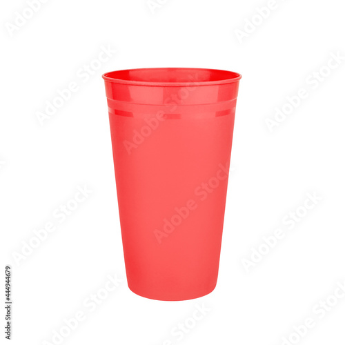 Red empty plastic cup white background isolated closeup, disposable blank glass for drink, beverage, cocktail, cold water, hot coffee mug, tea, fruit juice, tableware design, utensil, container mockup