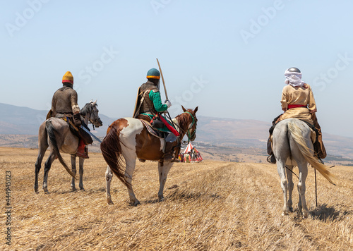 Horse and foot warriors - participants in the reconstruction of Horns of Hattin battle in 1187  are on the battle site  near TIberias  Israel