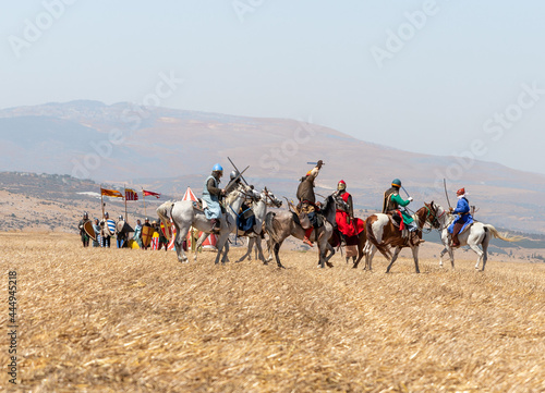 Horse and foot warriors - participants in the reconstruction of Horns of Hattin battle in 1187, are on the battle site, near TIberias, Israel photo