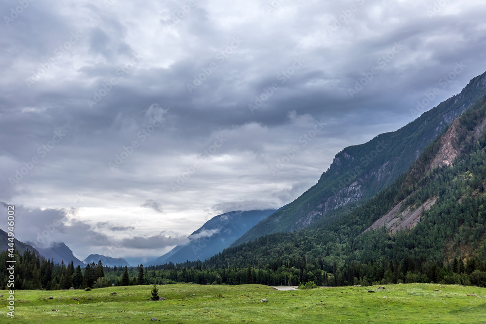 Mountain landscape with cloudy sky. Ongudaysky district, Altai Republic