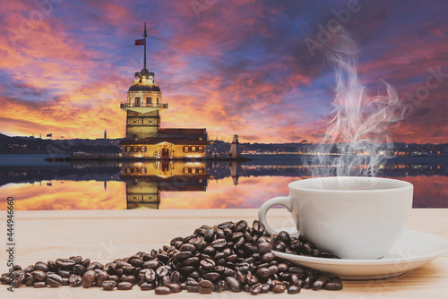 Coffee on wooden table with Maiden's Tower in istanbul, Turkey photo