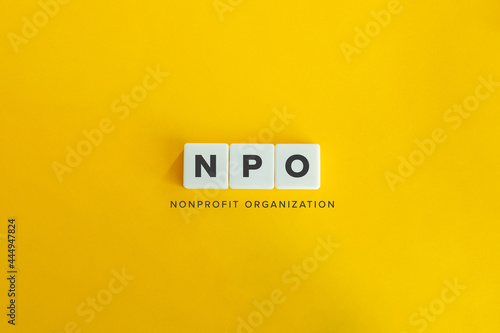 NPO (Non Profit Organisation) banner and concept. Block letters on bright orange background. Minimal aesthetics. photo
