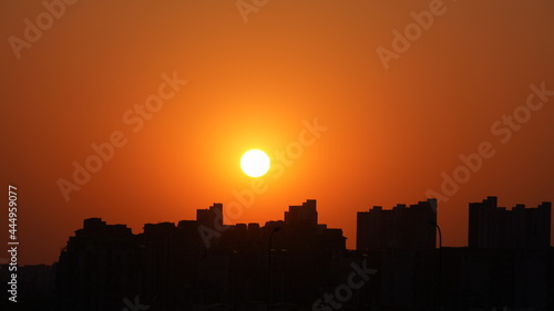 The beautiful sunset view with the buildings and cityscape in the city