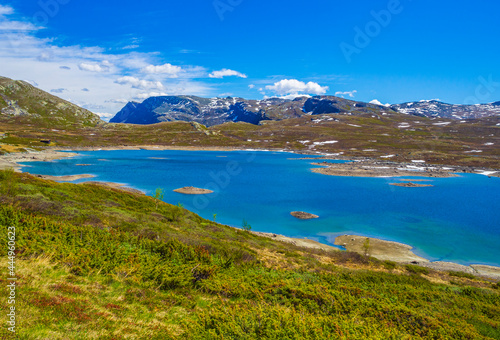 Amazing Vavatn lake panorama rough landscape boulders mountains Hemsedal Norway. © arkadijschell