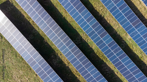 Aerial View of Solar Panels on a Ecological Farm. Electrical innovation nature environment