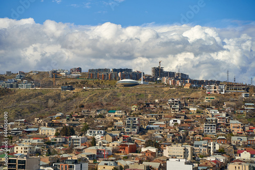 Panorama of a densely populated city. Tbilisi city landscape from above © Kate