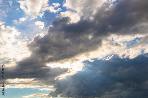 Dark sky background before a thunderstorm with light from the sky.