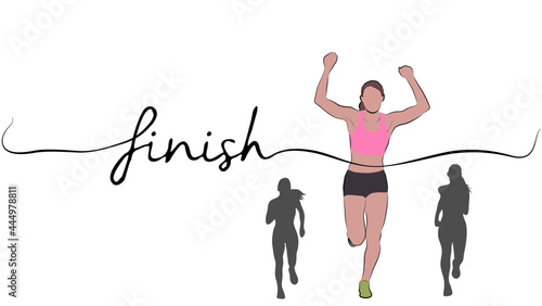 Winning female athlete crosses the finish line with finish   letter.