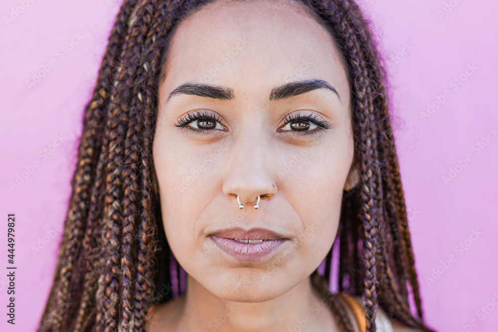 Beautiful mixed race young woman looking on camera Beautiful mixed race young woman looking on camera