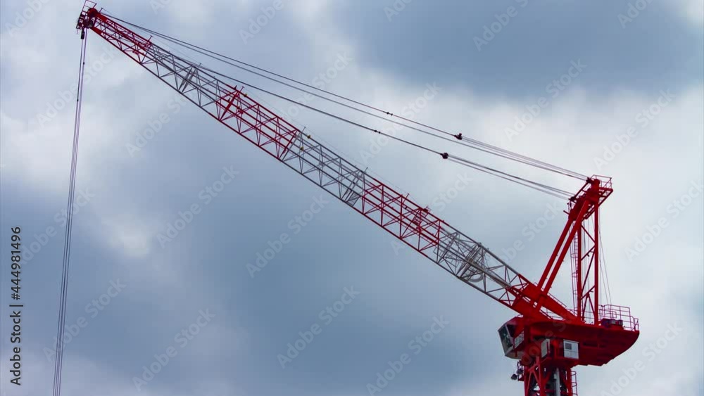 A timelapse of crane at the under construction in Shinjuku long shot tilt A timelapse of crane at the under construction in Shinjuku long shot tilt