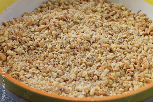 The process of making a delicious Turkish national dessert - baklava with walnuts