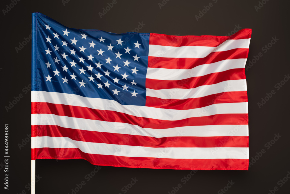 read and blue flag of america with stars and stripes isolated on black read and blue flag of america with stars and stripes isolated on black
