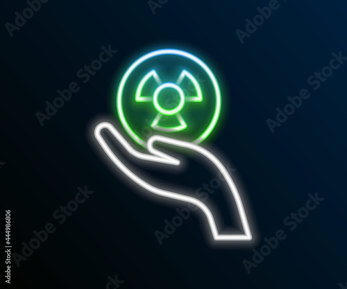 Glowing neon line Radioactive in hand icon isolated on black background. Radioactive toxic symbol. Radiation Hazard sign. Colorful outline concept. Vector