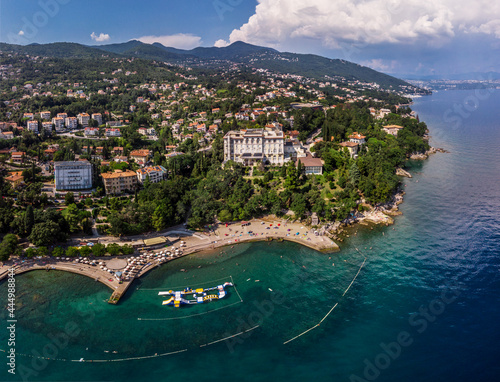 Fototapeta Naklejka Na Ścianę i Meble -  Beautiful panoramic view of Lovran village and its sea shore in Croatia. Top view photo taken on drone.
