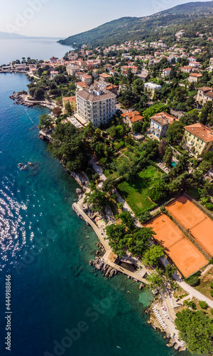 Fototapeta Naklejka Na Ścianę i Meble -  Beautiful panoramic view of Lovran village and its sea shore in Croatia. Top view photo taken on drone.