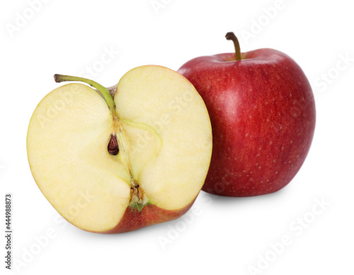 Whole and cut apples on white background