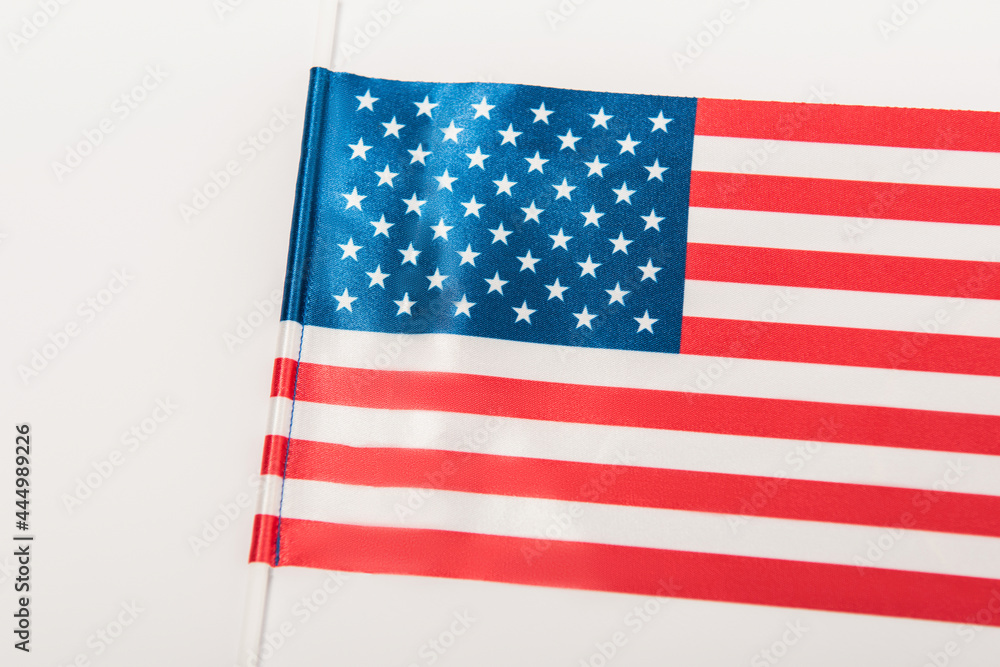 top view of american flag with stars and stripes isolated on white