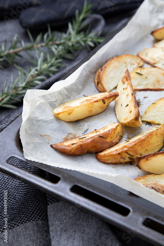 Rosemary covered potato wedges snack food photo