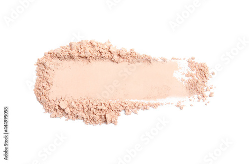 Swatch of crushed face powder on white background, top view