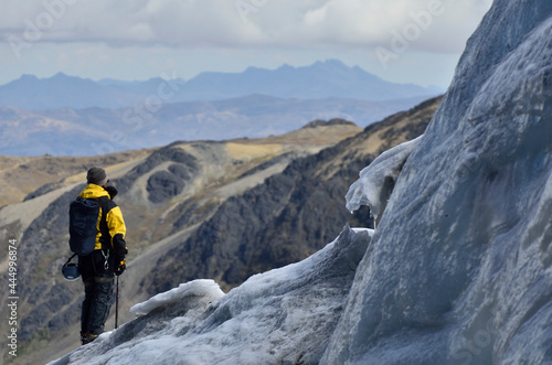 Mountaineer on the snowy Colque Punku in Cusco, Peru photo