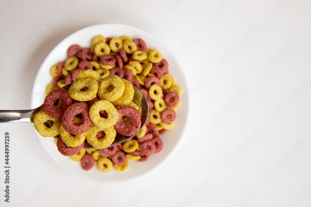 cereal cheerios in bowl on white background, healthy breakfast concept cereal cheerios in bowl on white background, healthy breakfast concept