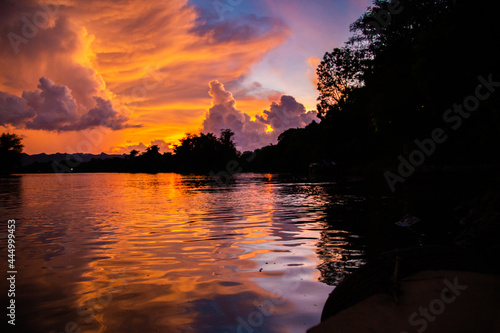 Sunset on Kanchanaburi River Khwae Yai or Kwai in Thailand