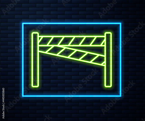 Glowing neon line Crime scene icon isolated on brick wall background. Vector