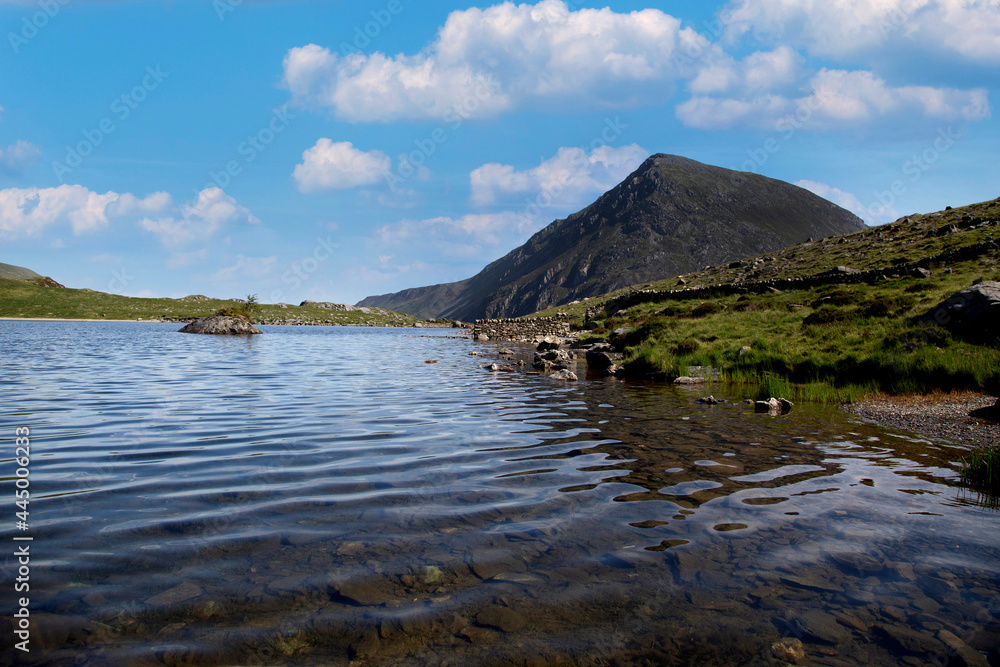 Pen Yr Ole Wen mountain reflected in the water of Llyn Idwal at Snowdonia National Park, North Wales.