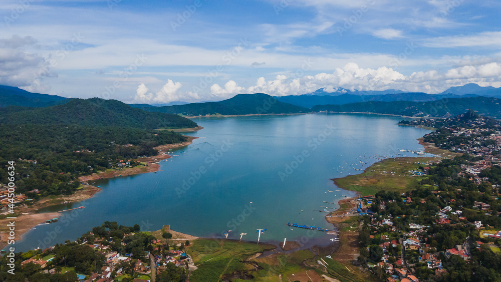 Aerial landscape of the magical town of Valle Bravo, State of Mexico, where the lake and the town are distinguished between the mountains