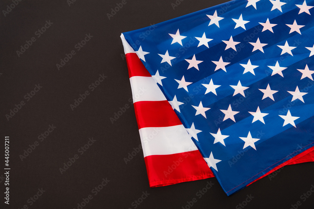 Fototapeta premium red and blue flag of usa isolated on black