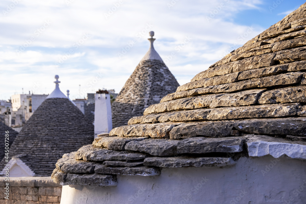 Beautiful town of Alberobello with typical trulli houses built from stone, main touristic district, Apulia region, Southern Italy, UNESCO World Heritage Site