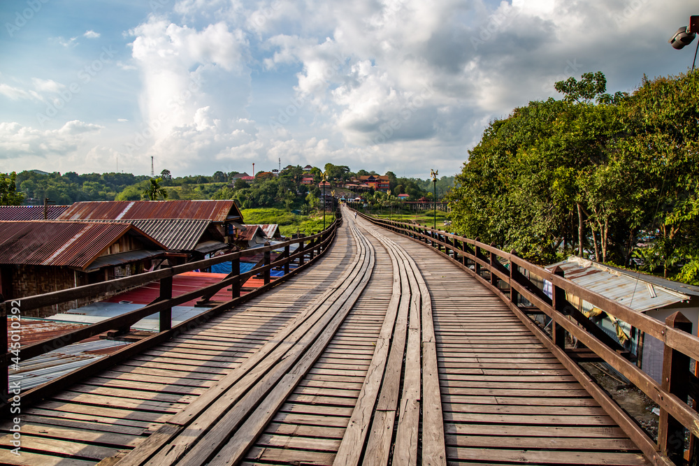 Mon Bridge, old wooden bridge at sunset in Sangkhlaburi, Kanchanaburi, Thailand Mon Bridge, old wooden bridge at sunset in Sangkhlaburi, Kanchanaburi, Thailand