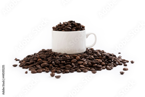 Coffee mug fulled of coffee beans isolated