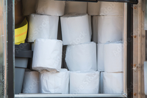 Individual Rolls Of Toilet Paper Are Stacked In Supply Truck
