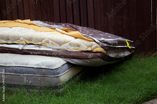 old mattresses in the trash