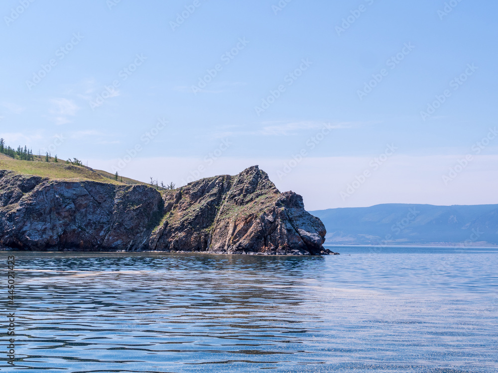 View of Lake Baikal in the early summer morning. Olkhon Island. View of Lake Baikal in the early summer morning. Olkhon Island.