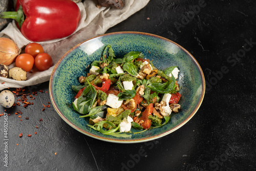 Greek salad with walnuts and feta cheese