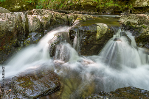 Long exposure of a waterfall on the East Lyn river at Watersmmeet In Exmoor National Park