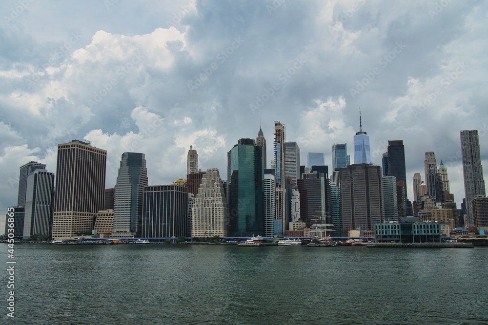 A view of Manhattan skyline from Brooklyn bridge park in New York City, USA