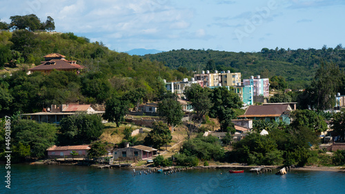 Colorful buildings and villas on the coast line of Santiago de Cuba, Cuba