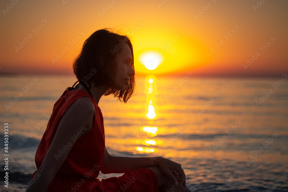 Fototapeta premium person watching sunset