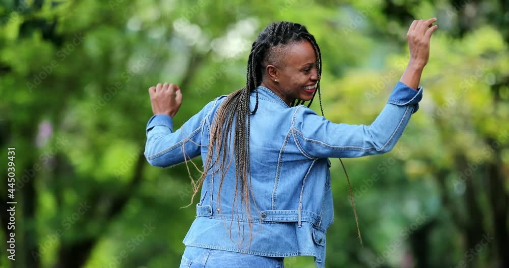 Hispanic black woman dancing outside, female dancer in street Hispanic black woman dancing outside, female dancer in street